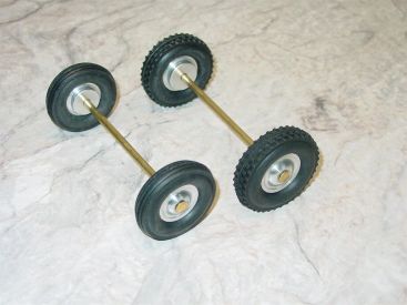 Cox Thimble Drome Champion Pusher Wheel/Tire/Axle Replacement Part Set Main Image